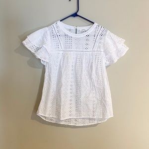 White eyelet top with ruffle sleeves